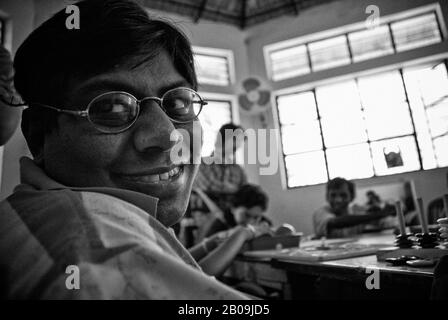 Prabhu, eines der Kinder mit Zerebraler Palisie, bei der Elternvereinigung von Personen mit Zerebraler Palisie und Assoziierten Erkrankungen (PAPCP) in Bangalore, Indien. Januar 2009. Eines der Bilder aus der Fotogeschichte Cerebral Palsy von Ayush Ranka. Stockfoto