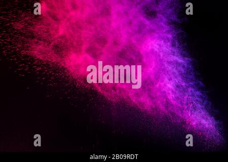 Abstrakter Farbspritzer für das Tapeten-Design. Bunter Staub explodieren. Farbe spritzt auf weißem Hintergrund Stockfoto