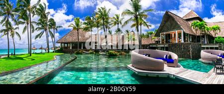 Luxusurlaub - Insel Mauritius. Herrliche Strandresorts im tropischen Paradies Stockfoto