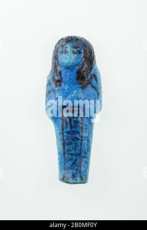 Arbeiter Shabti von Any, Dritte Zwischenzeit, Dynastie 21, Herrschaft Psusennen I., ca. 1050 v. Chr., Aus Ägypten, Oberägypten, Theben, Deir el-Bahri, Grab von Meritamun, erster Gang, Beisetzung von Any, 198-29, Faience, H. 8,6 × W. 3,2 × D. 1,8 cm (8,6 × 3,2 × 1,8 cm Stockfoto