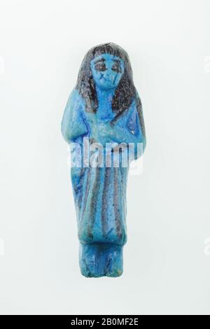 Aufseher Shabti von Any, Dritte Zwischenzeit, Dynastie 21, Herrschaft Psusennen I., ca. 1050 v. Chr., Aus Ägypten, Oberägypten, Theben, Deir el-Bahri, Grab von Meritamun, erster Korridor, Beisetzung von Nany, 190-29, Faience, H. 9,7 × W. 3,6 × D. 2,6 cm (3 13/16 × 1 7/16 × 1 Zoll Stockfoto