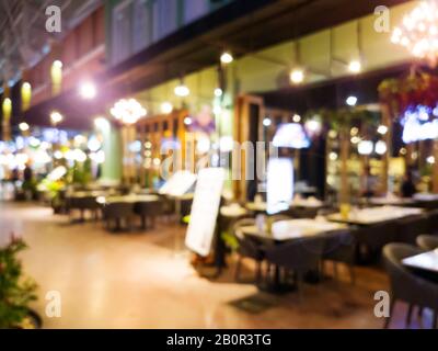 Bild des Abstrakten blur Restaurant mit Menschen. Restaurant mit Kunden für die Nutzung Stockfoto