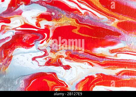 Ein schöner Acryl-Hintergrund in rot und blau. Abstrakte, bunte Textur, Tapete, Hintergrund für Design und Kreativität. Mischen von Farben, Modus Stockfoto