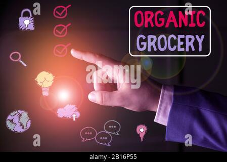 Konzeptionelle Handschreiben mit Organic Grocery. Konzept bedeutet Markt mit Lebensmitteln, die ohne Düngemittel angebaut werden Stockfoto