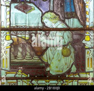 Glasfenster Detail des Kindes mit Tauben Hacheston Kirche, Suffolk, England, Großbritannien c 1922 von Kempe und Co Stockfoto