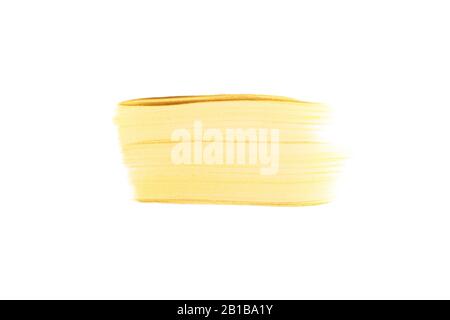 Rechteckiger goldfarbener Pinselstrich oder -Abstrich isoliert auf Weiß. Draufsicht. Verspotten Sie sich mit einem Kopierspeicherplatz. Golden Metallic Schmiermuster Stockfoto