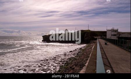 Dramatische saisonale Wolken im Dunmore East Harbor, County Waterford, Irland. Stockfoto