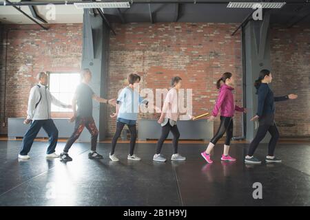 Die Weitergabe von Baton über Generationen Stockfoto