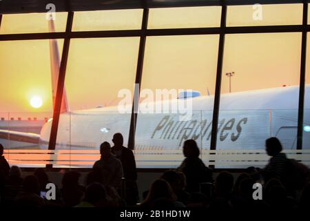 Reisende am Ninoy Aquino International Airport (NAIA) in Manila, Philippinen Stockfoto