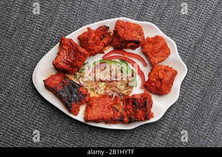 Huhn Tikka masala. Huhn in Joghurt und Gewürzen mariniert und anschließend in Tomatensauce serviert Stockfoto