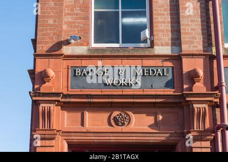 Die Fabrik von Thomas Fattorini stellt Abzeichen, Medaillen, Schwerter und Trophäen in Birmingham's Jewelry Quarter, Hockey, Birmingham, Großbritannien her Stockfoto