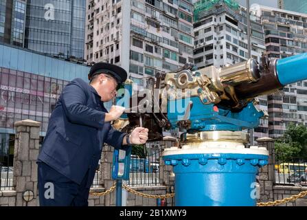 Hongkong, Hongkong SAR, CHINA: 21. Juni 2019.Jardine Noonday Gun Causeway Bay Hong Kong.The Noonday Gun ist ein ehemaliges Marine-Artillerie-Stück, auf dem montiert ist Stockfoto