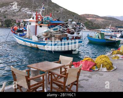 Abendstimmung auf der Insel Meis, auch Kastellorizo genannt, Fischerboote im Hafen, Insel Meis, Griechenland Stockfoto