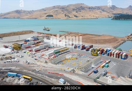 Land im Lyttelton Harbour, Lyttelton, Banks Peninsula, Canterbury Region, Neuseeland zurückfordern Stockfoto