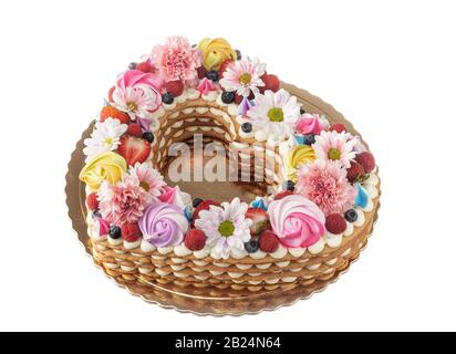 Herzförmige Puffkuchen mit Obst und Blumen Stockfoto