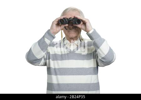 Alter Mann mit dem Fernglas. Stockfoto