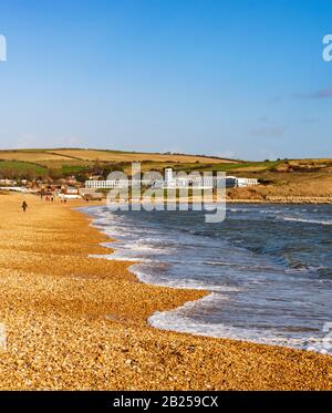 Schindelstrand bei Sonnenuntergang am Bowleaze Cove Weymouth Dorset Stockfoto