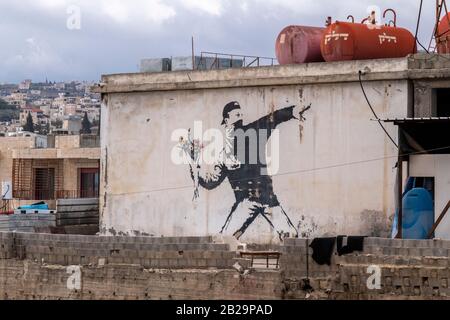 Banksy Kunstwerk in Bethlehem, Palästina Stockfoto