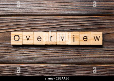 Übersicht Wort auf Holz Block geschrieben. Übersicht text auf Holz- Tabelle für Ihr Design, Konzept. Stockfoto