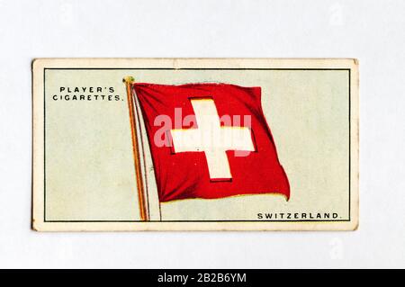 Die Zigarettenkarte des Spielers in Flags der Serie Völkerbund zeigt die Flagge der Schweiz. Ausgabe Von 1928. Stockfoto