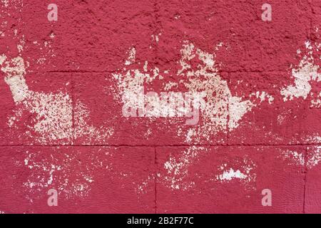 Grunge Hintergrund rote Textur einer alten schäbigen Wand mit Weiß Stockfoto