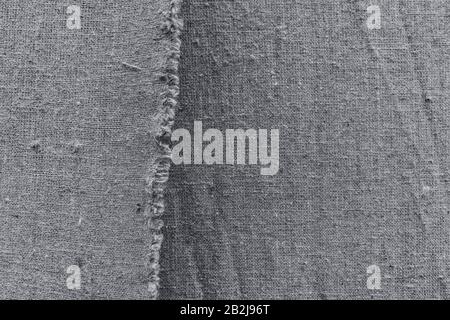 Hintergrund aus grauem, rauem, handgefertigtem Material Stockfoto