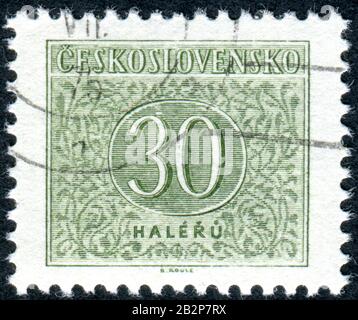 Tschechoslowakei - CIRCA 1954: Eine Briefmarke aus dem Briefmarkenduo, die in der Tschechoslowakei gedruckt wurde, zeigt ein Blumendesign und einen Preis von ca. 1954 Stockfoto
