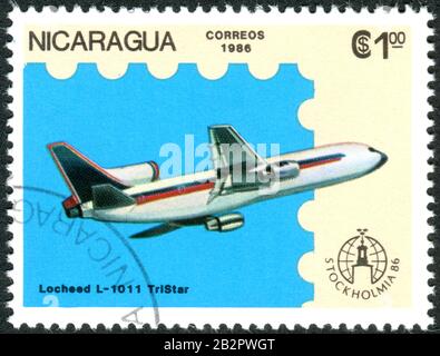 Nicaragua - CIRCA 1986: Eine in Nicaragua gedruckte Briefmarke, die das Flugzeug Lockheed L-1011 Tristar, ca. 1986, abbildete Stockfoto