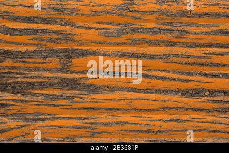 Abbildung: Holzstruktur von farbigen orangefarbenen Platten. Alte Klassiker und alte Holztafeln. Stockfoto