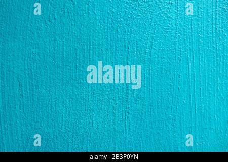 Abstrakte Grunge hellblau cyan bemalte stuckierte Wandtextur Hintergrund mit Kopierraum Stockfoto