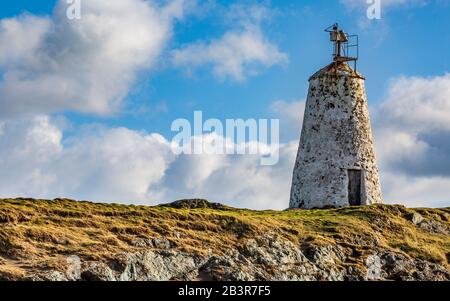 Der ursprüngliche Leuchtturm Von Twr Bach auf der Insel Llanddwyn, Anglesey Stockfoto