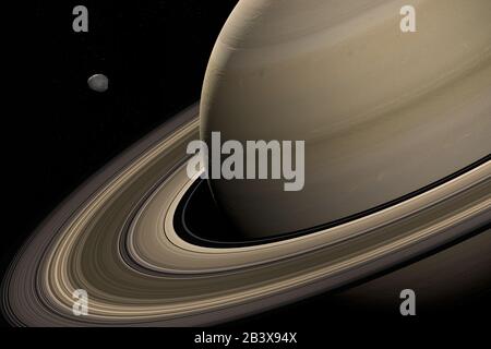 Janus, der innere Satellit, umkreist den Saturnplaneten. 3D-Rendering Stockfoto