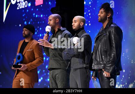 Gastgeber JLS (Oritse Williams, Marvin Humes, Aston Merrygold und JB Gill) auf der Bühne bei den Global Awards 2020 mit Very.co.uk im Londoner Eventim Apollo Hammersmith. Stockfoto