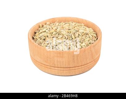 Hölzerne Schüssel mit trockenen Fenchel auf weißem Hintergrund Stockfoto