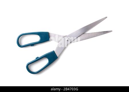 Schere mit grünem Griff isoliert auf weiß Stockfoto