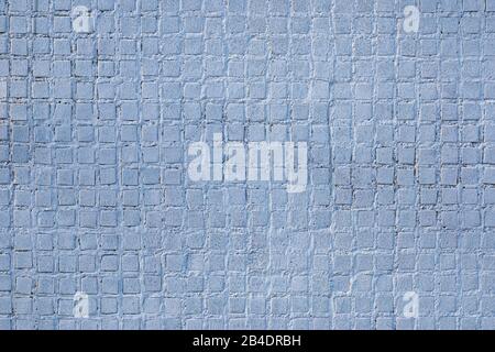 Textur der hellblauen Wand mit kleinen Kacheln Stockfoto