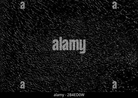 Die abstrakte Risse und Muster einer zerbrochenen Fensterscheibe. Stockfoto