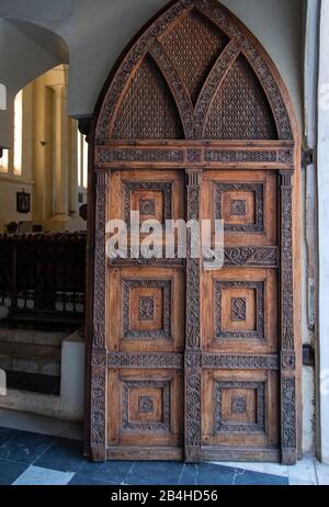 Tansania, Insel Sansibar: Anglikanische Kirche in der Steinstadt, die auf dem Gelände des alten Sklavenmarktes errichtet wurde, als Mahnmal gegen den Handel mit Sklaven. Eingangstür zur Kirche. Stockfoto