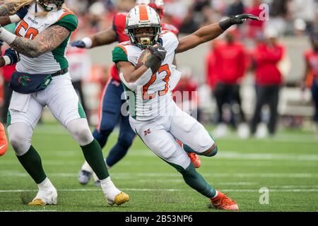 Houston, TX, USA. März 2020. Seattle Dragons, der zurückläuft Trey Williams (23) läuft für einen Touchdown während des 2. Viertels eines XFL Fußballspiels zwischen den Seattle Dragons und den Houston Roughnecks im TDECU Stadium in Houston, TX. Trask Smith/CSM/Alamy Live News Stockfoto