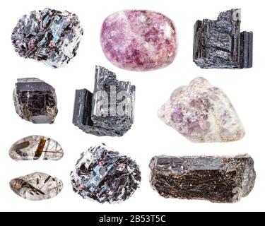 Satz verschiedener tourmaliner Mineralien in Felsen isoliert auf weißem Hintergrund Stockfoto