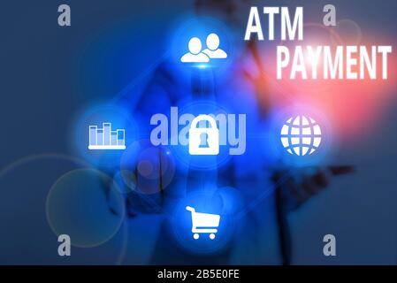 Schreiben Hinweis mit ATM-Zahlung. Business Konzept für bargeldlose Zahlung durch tragbare elektronische Geräte Stockfoto