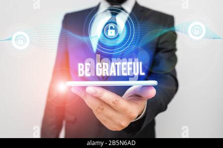 Konzeptionelle Hand schreiben, dankbar sein. Begriff Sinne Gefühl oder eine Anerkennung für etwas empfangen Stockfoto