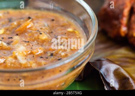 Salsa Tamulado im Yucatan-Stil, eine pikante Sauce auf Habanero-Basis, die mit vielen Yucatecan-Gerichten serviert wird Stockfoto