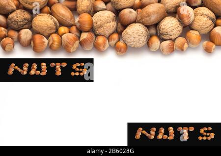 Reihe von auf weißem Hintergrund isolierten Nussstellen Stockfoto