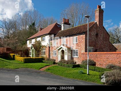 Häuser im Dorf Kirkburn, East Yorkshire, England Großbritannien Stockfoto