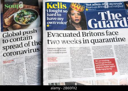 "Evakuierte Briten stehen zwei Wochen unter Quarantäne" in Großbritannien, nachdem sie die chinesische Zeitung Coronavirus Guardian am 30. Januar 2020 in London auf der Titelseite verlassen haben Stockfoto