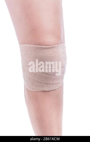Sportverletzungen am Knie. Bandage elastisch gebunden. Stockfoto
