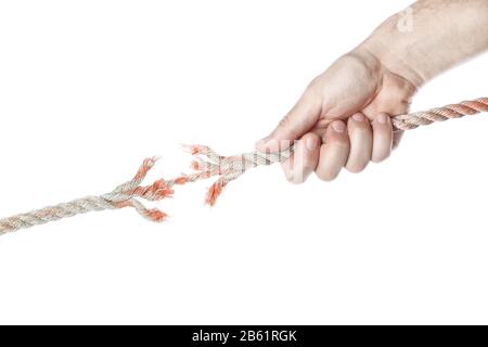 Die Hand des Menschen zieht das Seil und bricht. Auf weißem Hintergrund. Stockfoto