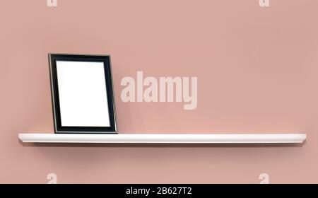 Leerer moderner Metallrahmen auf Holzwandboden Stockfoto