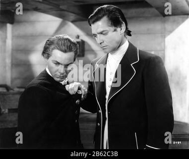 Eddie QUILLAN als Ellison und CLARK GABLE als Fletcher Christian in MEUTEREI AUF DEM KOPFGELDBUCH von Frank LLOYD aus dem Jahr 1935 Charles Nordhoff und James Norman Hall Metro Goldwyn Mayer Stockfoto